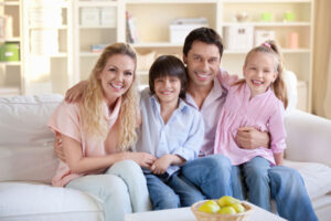 family enjoying home heating system in winter