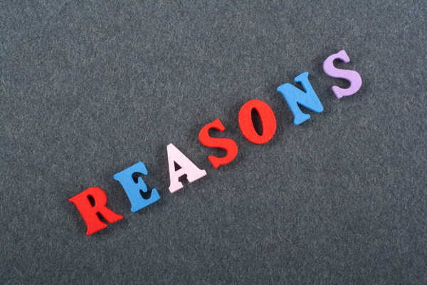 reasons spelled using colored wooden letters depicting ac unit water leak