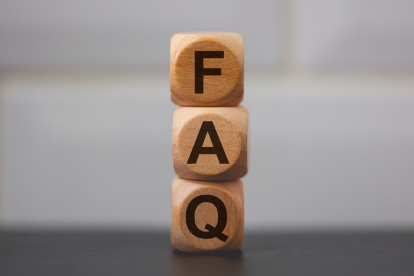 FAQ spelled using wooden blocks depicting questions about carbon monoxide