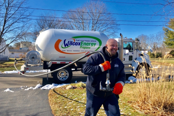 Wilcox Energy propane delivery man and truck