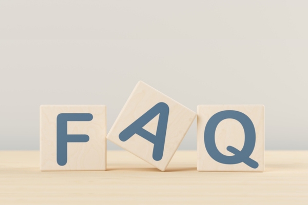 FAQ spelled using wooden blocks depicting questions about emergency heating repairs